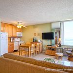 Kitchen on the left, living room and beautiful views on the right