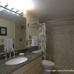 Tile walk-in shower, comfort height toilet, granite on the vanity